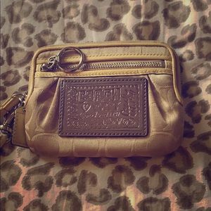 Coach wristlet white and beige